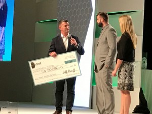 Jeff Acuff, Senior Vice President US Sales, Bioventus Presents Check for $10,000 to Representatives from Opportunity Village